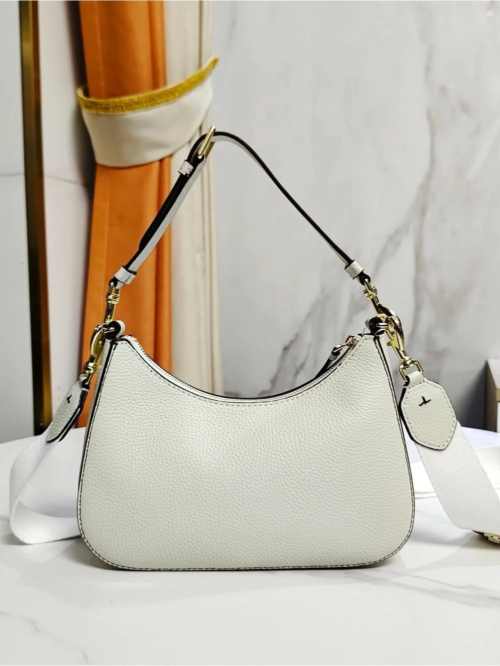 Tory Burch sleek pebbled